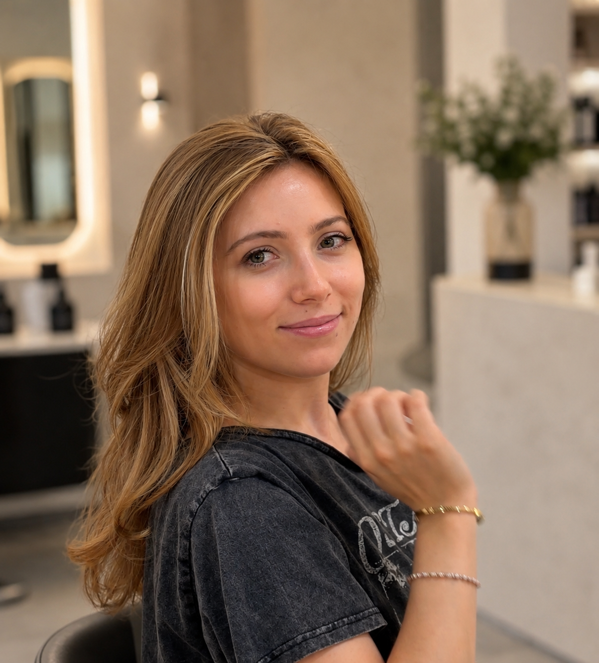 Golden blonde highlights salon portrait smiling